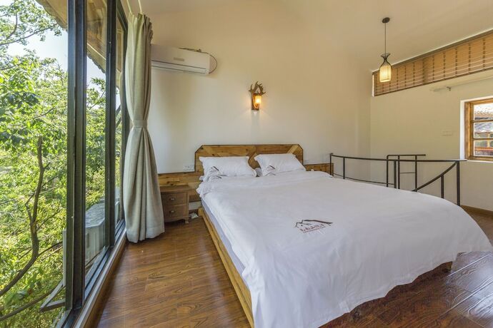 Imagen de la habitación del Hotel Jiannanshan Garden Homestay. Foto 18