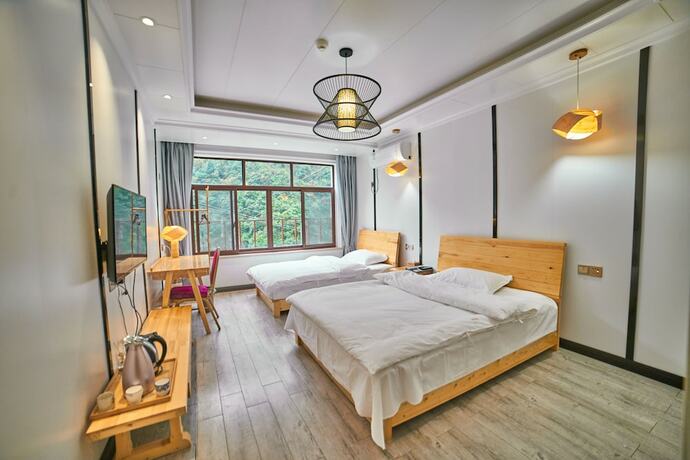 Imagen de la habitación del Hotel Jianqikezhan. Foto 15