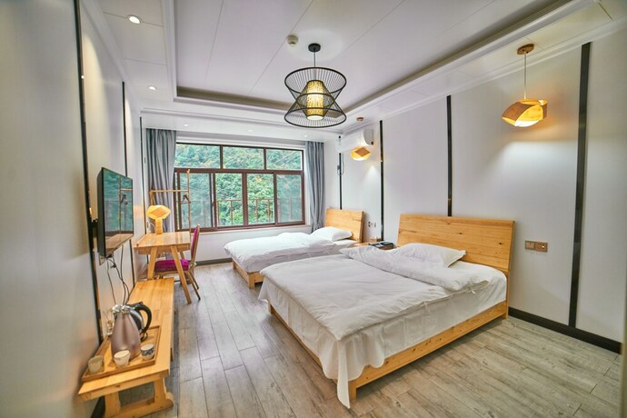 Imagen de la habitación del Hotel Jianqikezhan. Foto 19