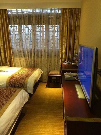 Imagen de la habitación del Hotel Jianshui San Long Hotel. Foto 7