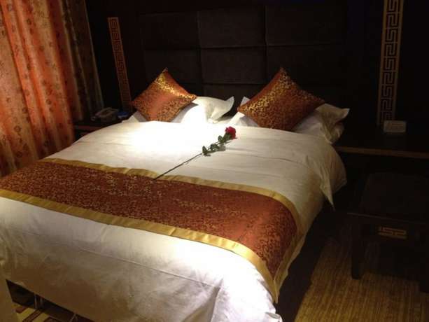 Imagen de la habitación del Hotel Jianshui San Long Hotel. Foto 8