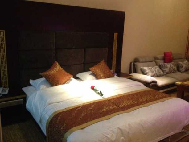 Imagen de la habitación del Hotel Jianshui San Long Hotel. Foto 11