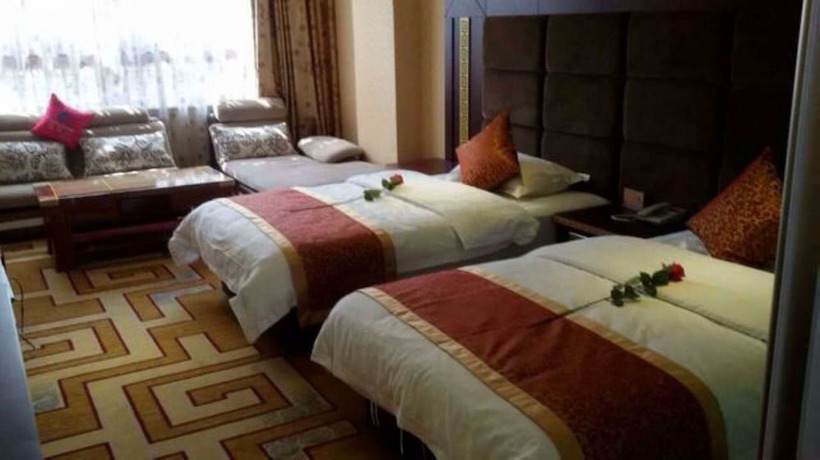 Imagen de la habitación del Hotel Jianshui San Long Hotel. Foto 13