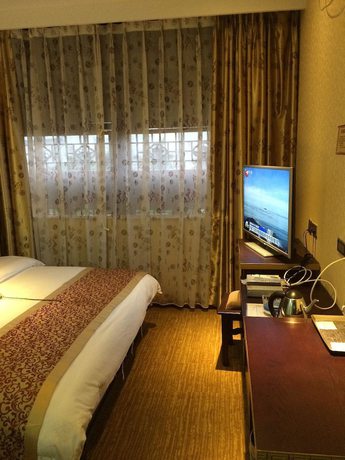 Imagen de la habitación del Hotel Jianshui San Long Hotel. Foto 16