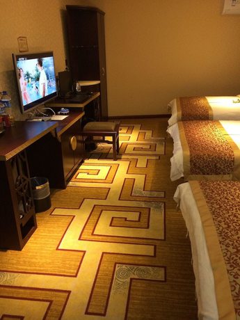 Imagen de la habitación del Hotel Jianshui San Long Hotel. Foto 17