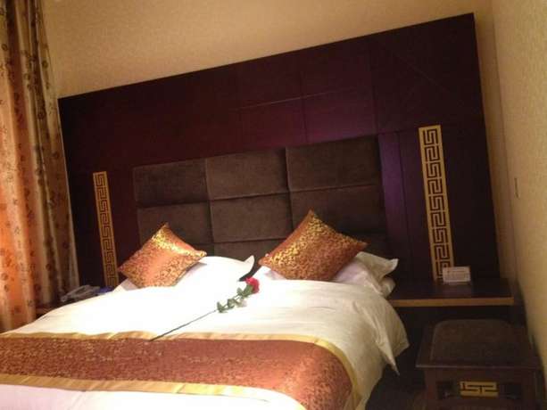 Imagen de la habitación del Hotel Jianshui San Long Hotel. Foto 18