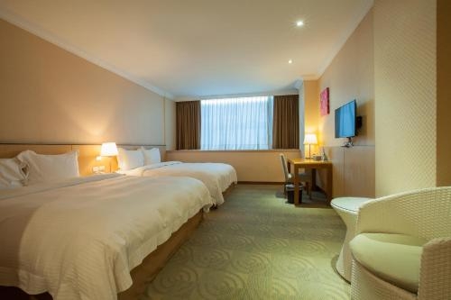 Imagen de la habitación del Hotel Jiaoxi-the Riverside. Foto 9