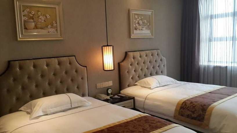 Imagen de la habitación del Hotel Jiaqi Landscape. Foto 8