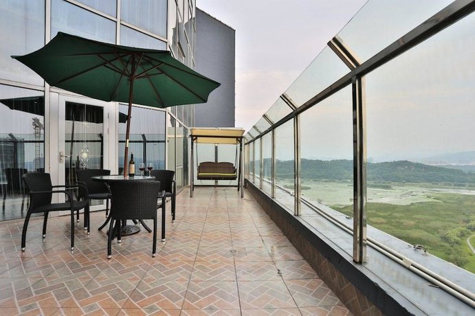 Imagen de la habitación del Hotel Jiaqi Landscape. Foto 12