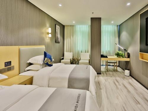 Imagen de la habitación del Hotel Jiari Meidi Chaozhou Hanshan Normal University. Foto 13