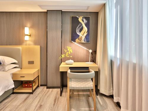 Imagen de la habitación del Hotel Jiari Meidi Chaozhou Hanshan Normal University. Foto 16
