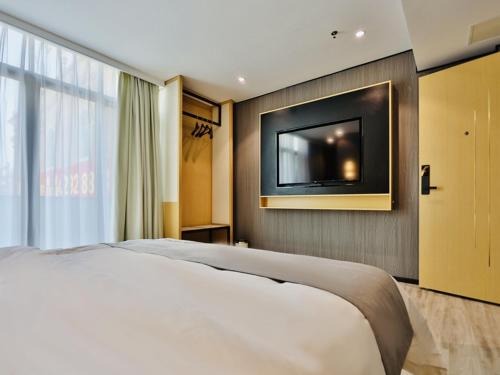 Imagen de la habitación del Hotel Jiari Meidi Chaozhou Hanshan Normal University. Foto 18