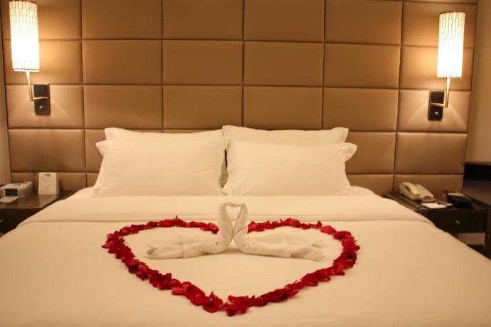 Imagen de la habitación del Hotel Jiaxin Conifer Shunde. Foto 7