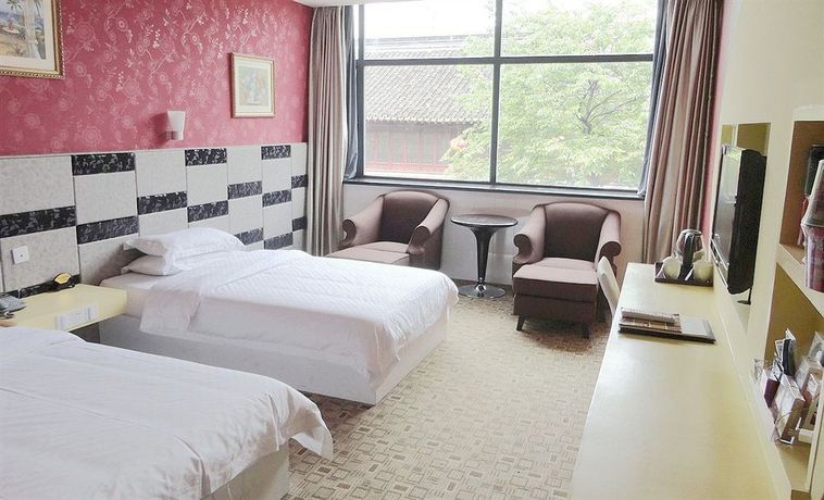 Imagen de la habitación del Hotel Jiaxing Meiwan Modern City. Foto 3