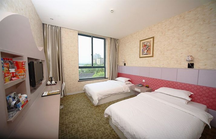 Imagen de la habitación del Hotel Jiaxing Meiwan Modern City. Foto 4