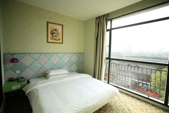Imagen de la habitación del Hotel Jiaxing Meiwan Modern City. Foto 5