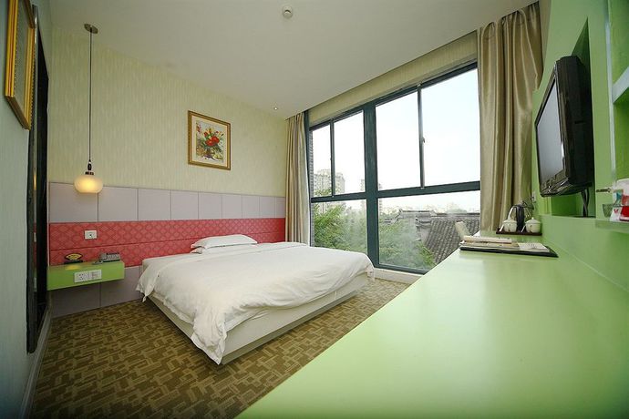 Imagen de la habitación del Hotel Jiaxing Meiwan Modern City. Foto 8