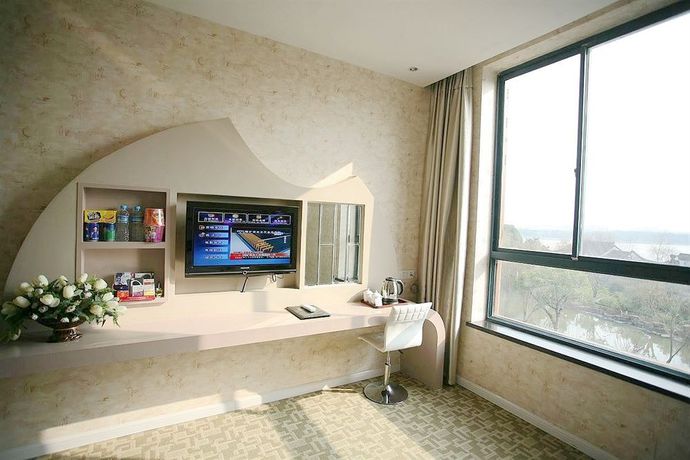 Imagen de los interiores del Hotel Jiaxing Meiwan Modern City. Foto 16