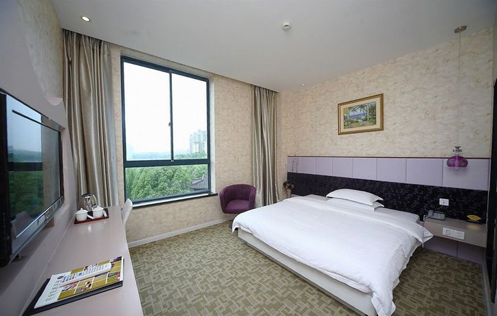 Imagen de la habitación del Hotel Jiaxing Meiwan Modern City. Foto 12