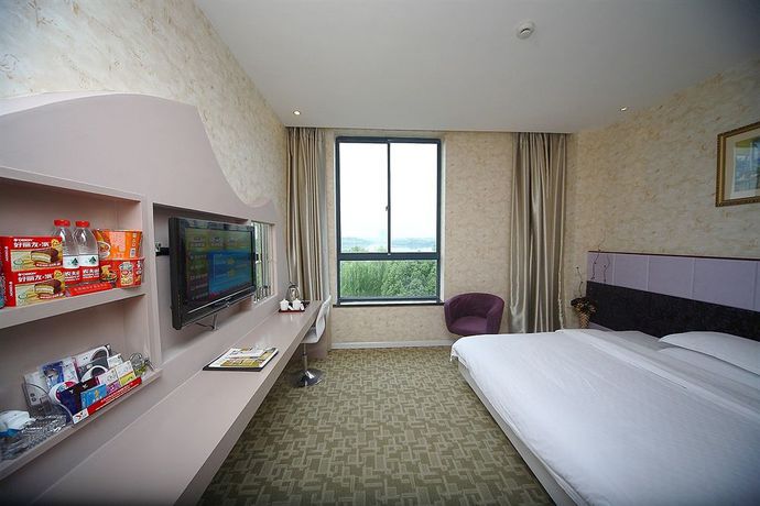 Imagen de la habitación del Hotel Jiaxing Meiwan Modern City. Foto 13