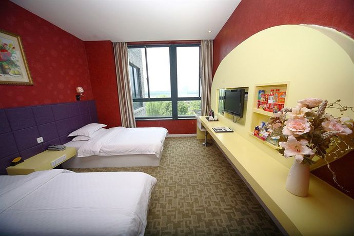 Imagen de la habitación del Hotel Jiaxing Meiwan Modern City. Foto 14