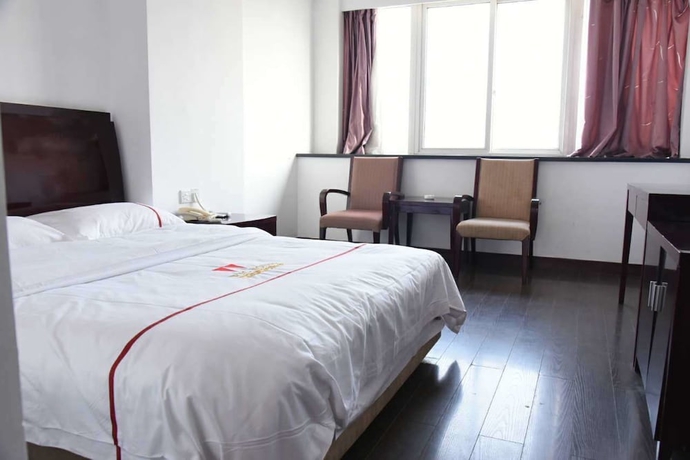 Imagen de la habitación del Hotel Jiaxing ShiMao Inn. Foto 3