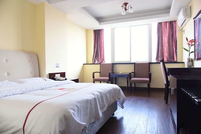 Imagen de la habitación del Hotel Jiaxing ShiMao Inn. Foto 4