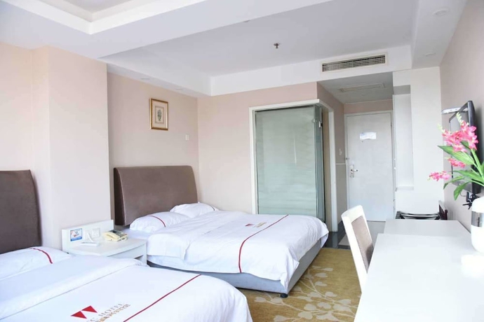 Imagen de la habitación del Hotel Jiaxing ShiMao Inn. Foto 7