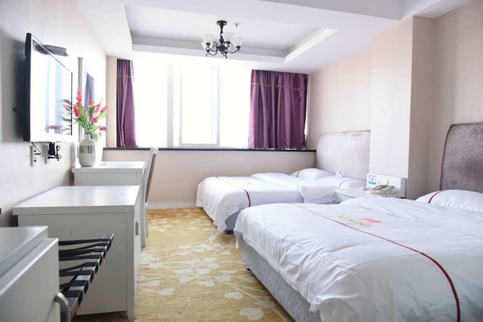Imagen de la habitación del Hotel Jiaxing ShiMao Inn. Foto 8