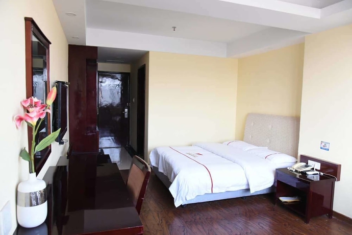 Imagen de la habitación del Hotel Jiaxing ShiMao Inn. Foto 9