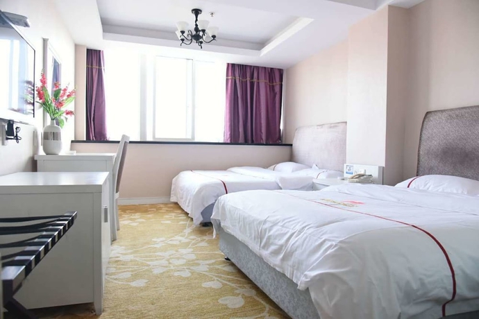 Imagen de la habitación del Hotel Jiaxing ShiMao Inn. Foto 10