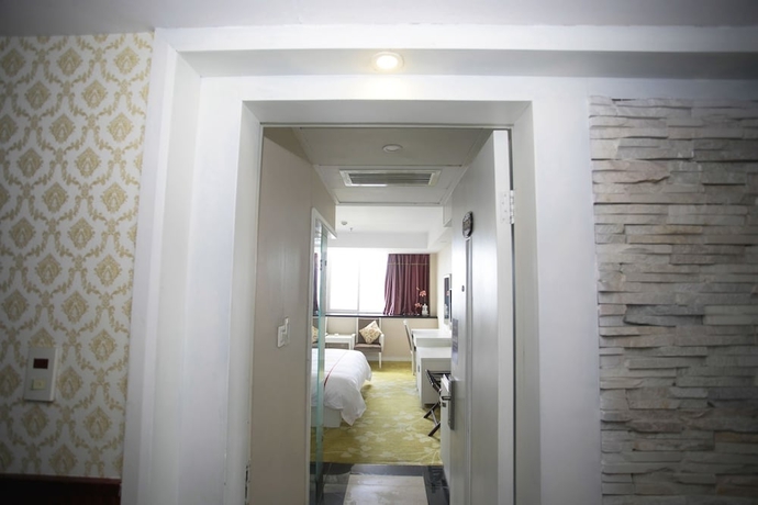 Imagen de la habitación del Hotel Jiaxing ShiMao Inn. Foto 11