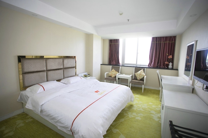 Imagen de la habitación del Hotel Jiaxing ShiMao Inn. Foto 12