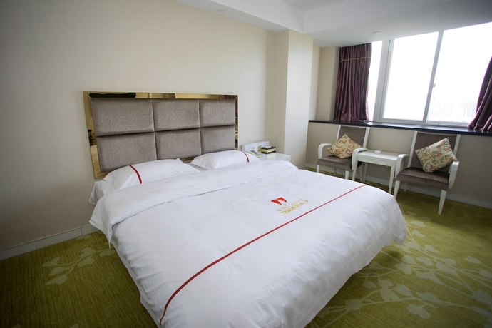 Imagen de la habitación del Hotel Jiaxing ShiMao Inn. Foto 13
