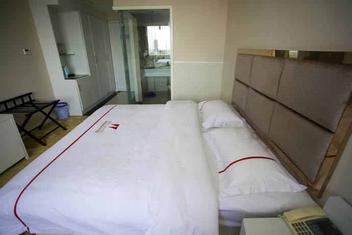 Imagen de la habitación del Hotel Jiaxing ShiMao Inn. Foto 14