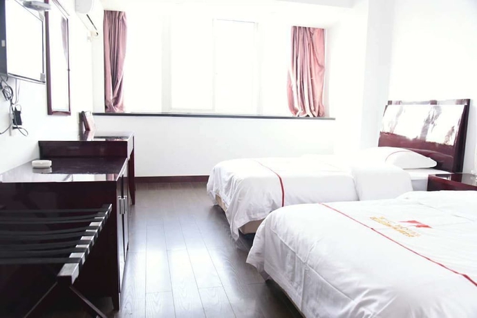Imagen de la habitación del Hotel Jiaxing ShiMao Inn. Foto 16