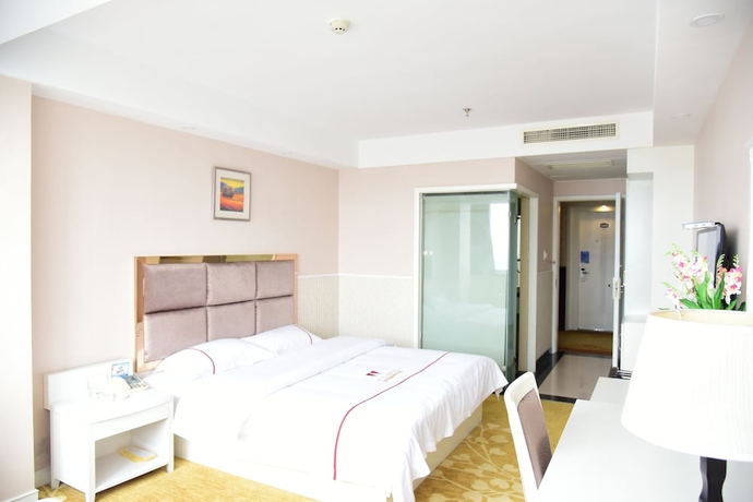 Imagen de la habitación del Hotel Jiaxing ShiMao Inn. Foto 17