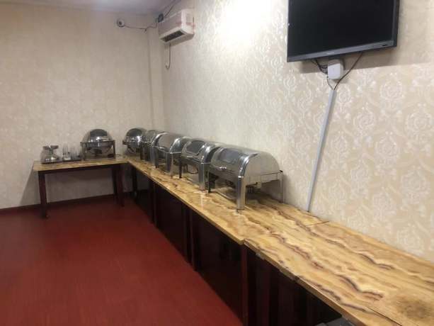 Imagen del bar/restaurante del Hotel Jiaxing Yijiangnan Holiday. Foto 3