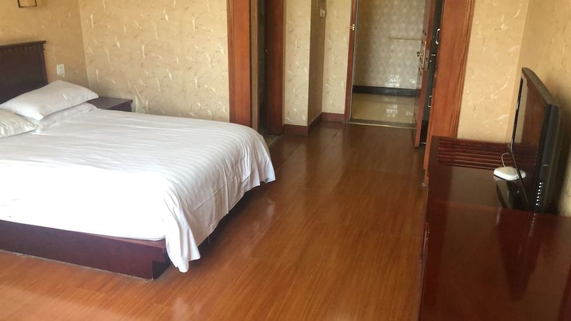 Imagen de la habitación del Hotel Jiaxing Yijiangnan Holiday. Foto 6