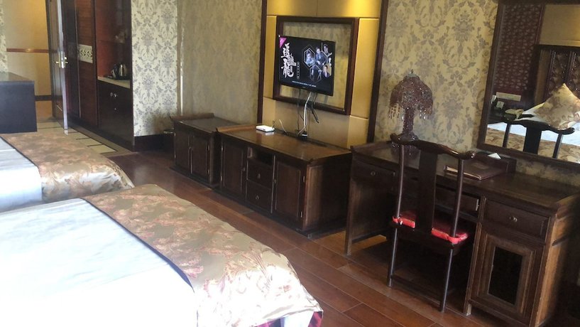 Imagen de la habitación del Hotel Jiaxing Yijiangnan Holiday. Foto 9