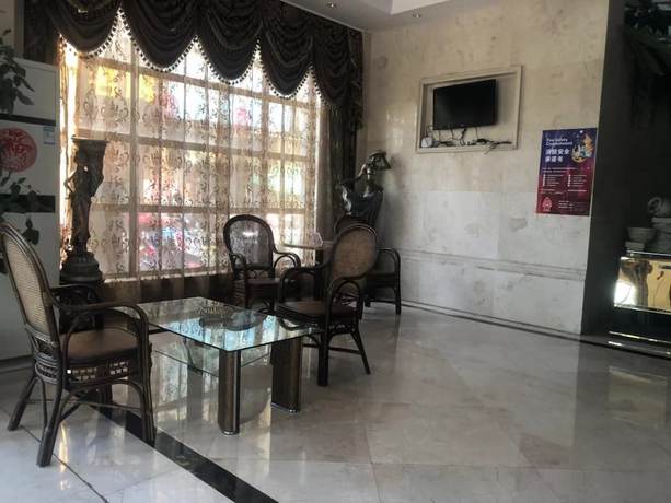 Imagen de los interiores del Hotel Jiaxing Yijiangnan Holiday. Foto 17