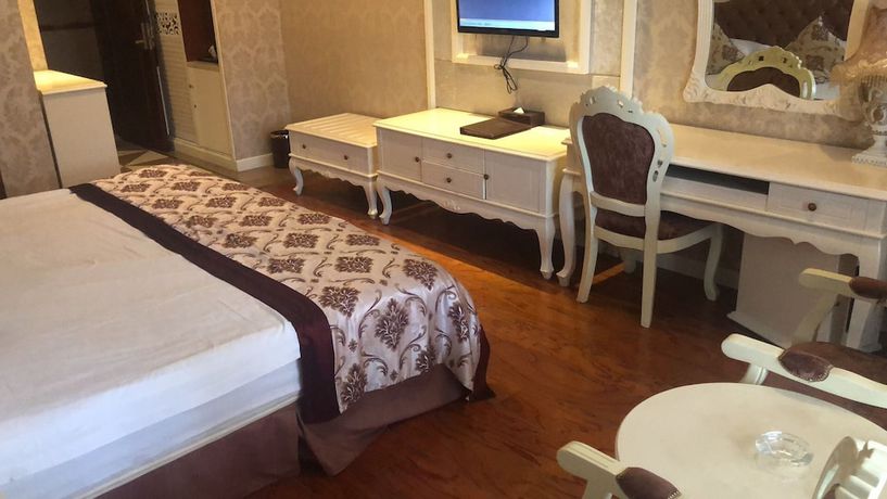 Imagen de la habitación del Hotel Jiaxing Yijiangnan Holiday. Foto 10