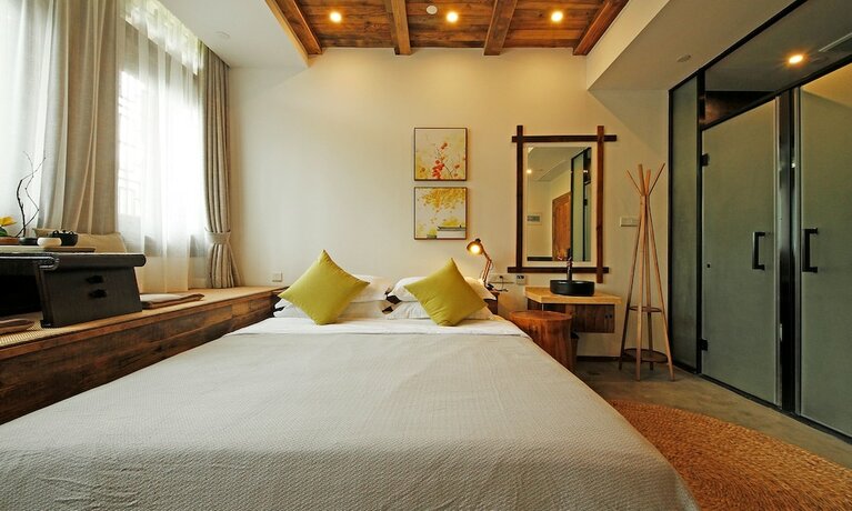 Imagen de la habitación del Hotel Jiaxing Zitaoxuan Inn. Foto 19