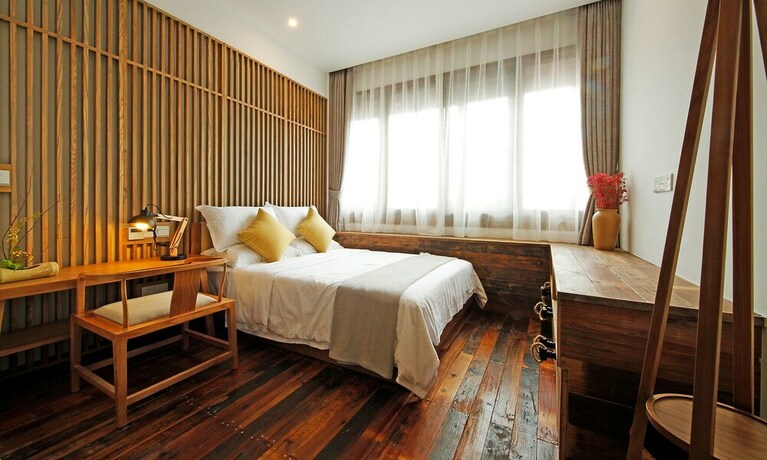 Imagen de la habitación del Hotel Jiaxing Zitaoxuan Inn. Foto 25