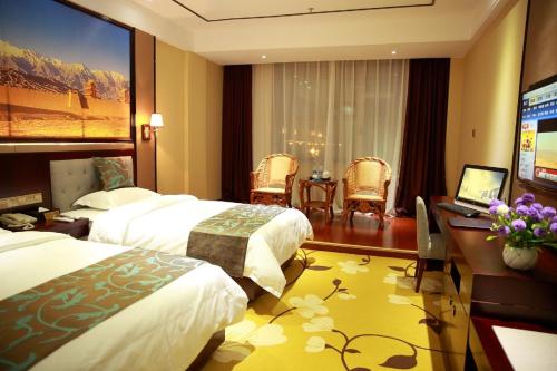 Imagen de la habitación del Hotel Jiayuguan Jingdu Holiday. Foto 6