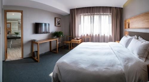 Imagen de la habitación del Hotel Jibei. Foto 4