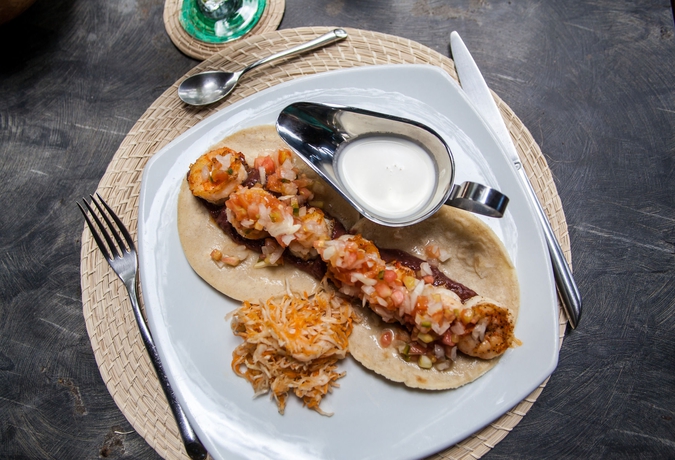 Imagen del bar/restaurante del Hotel Jicaro Island Lodge Member Of The Cayuga Collection. Foto 7