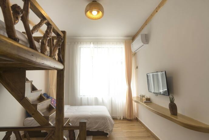 Imagen de la habitación del Hotel Jiesu Renwen Guest House. Foto 18