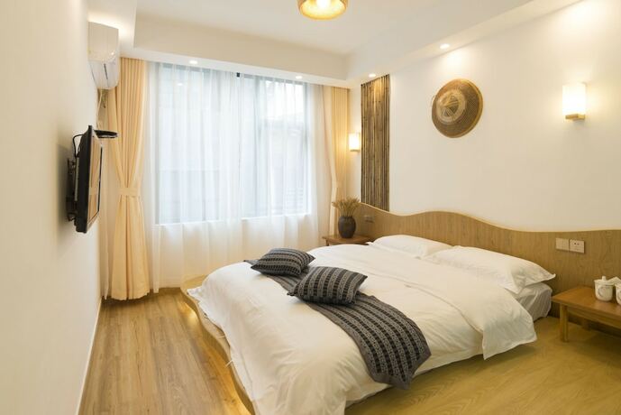 Imagen de la habitación del Hotel Jiesu Renwen Guest House. Foto 22