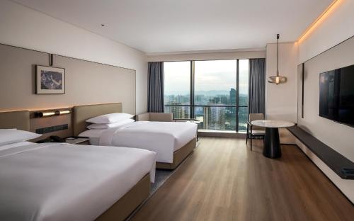Imagen de la habitación del Hotel Jieyang Marriott. Foto 18